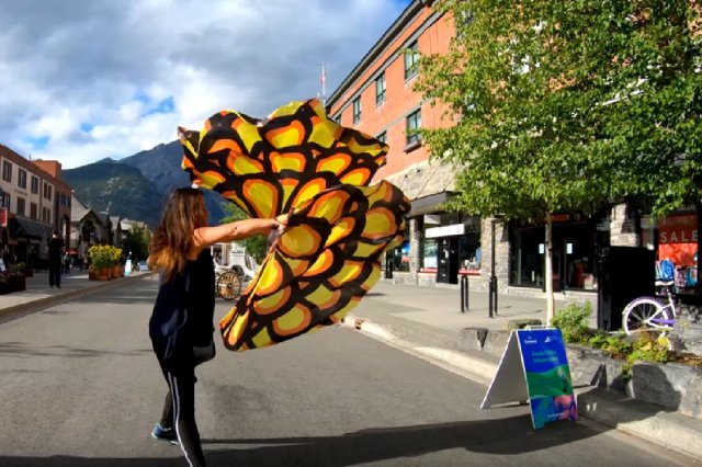 Christian woman flagging outdoors in Banff, Canada | OpentheWord.org