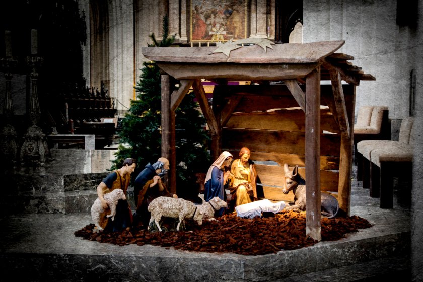 Nativity scene before Christmas with the traditionally empty crib