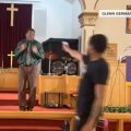 Pastor Glen Germany facing alleged assailant during Sunday morning service, May 5, 2024